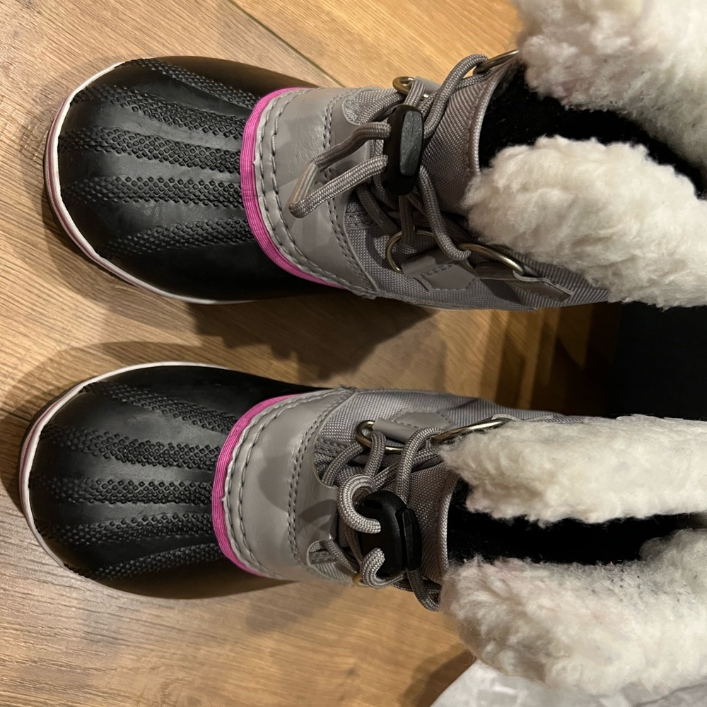 Children’s size 12 Sorel Yoot PAC Boots. Used for a weekend snow trip once!